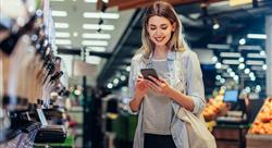 woman shopping looking at phone