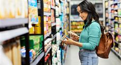 woman scanning the barcode of a soup can with her phone